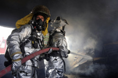 firefighters team action smoke night
